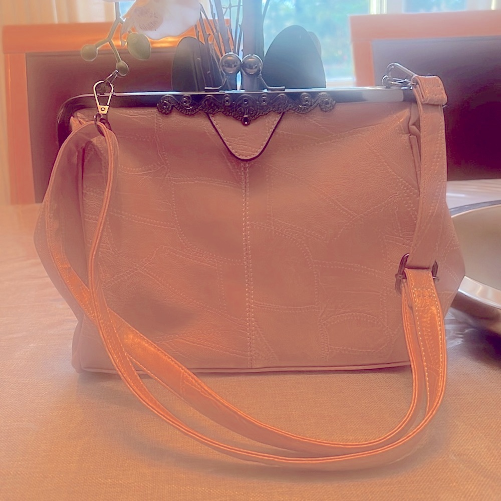 Beautiful vintage style handbag in pink . New